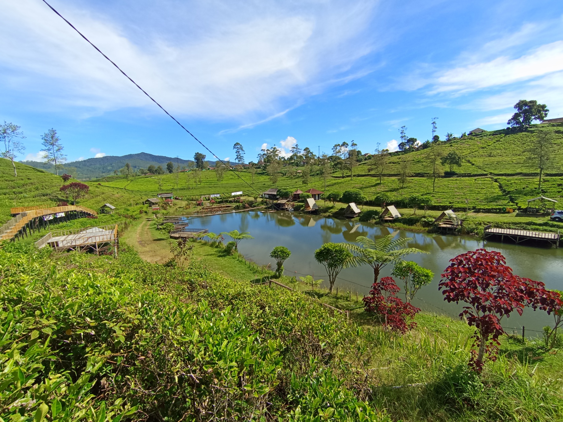 Panorama danau Situ Datar Buana dengan kebun teh